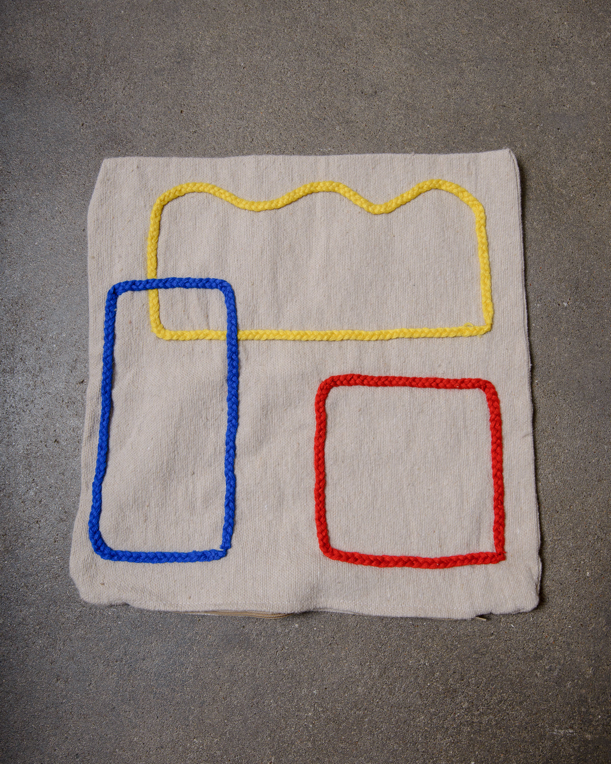 Handcrafted cushion cover from Morocco. Soft Wool cushion with modern, embroidered design.